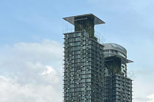 13.12.2025 - Grüne Hochhäuser in der Nähe der Petronas Towers in Kuala Lumpur